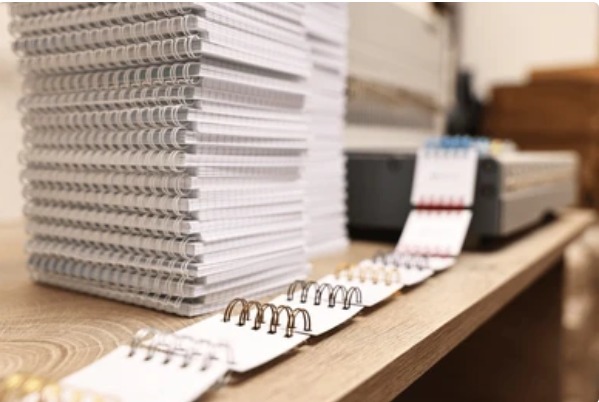 Bulk workbook printing with spiral binding